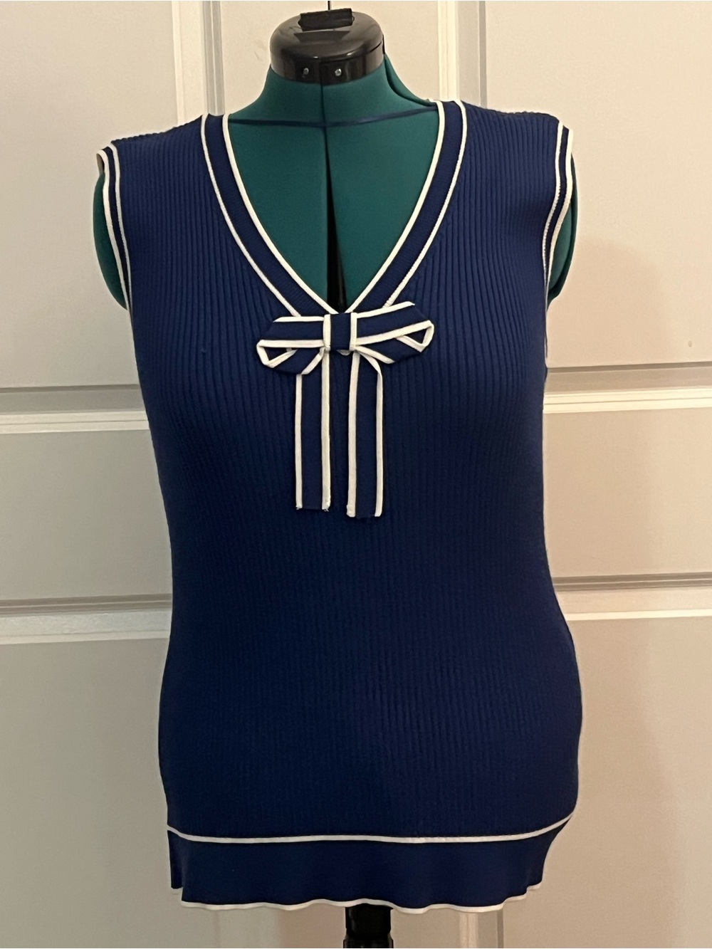 Elle Navy Ribbed V-Neck Sleeveless Sweater with White Trim and Bow
